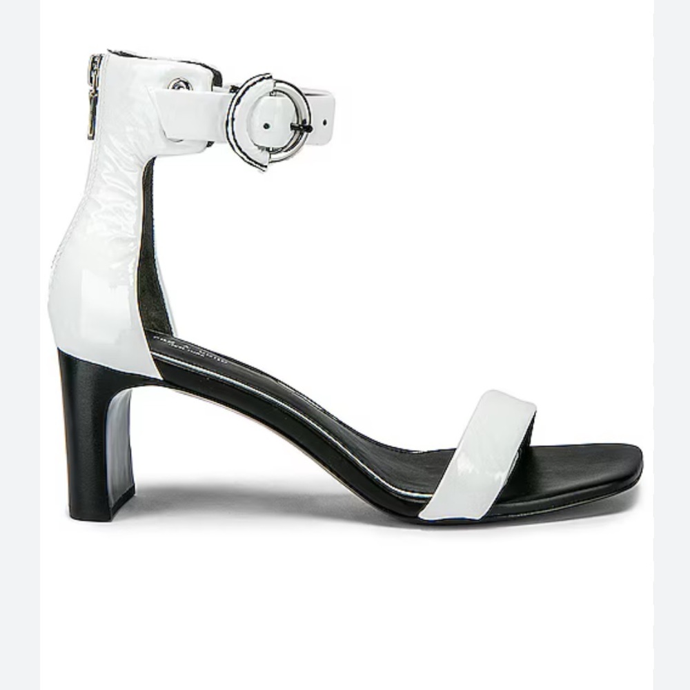 NIB Rag and Bone Ellis Mid Heel, never worn, they have a stain by the strap